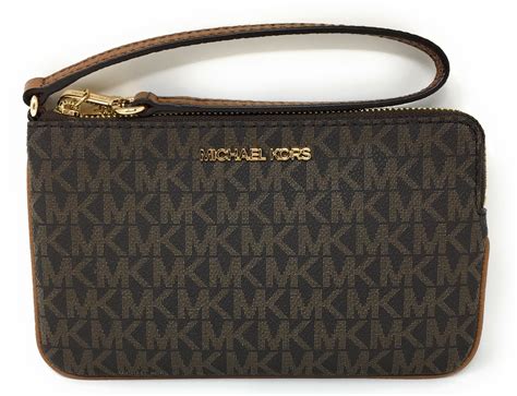 michael kors mickey mouse wallet|Michael Kors large wallet wristlet.